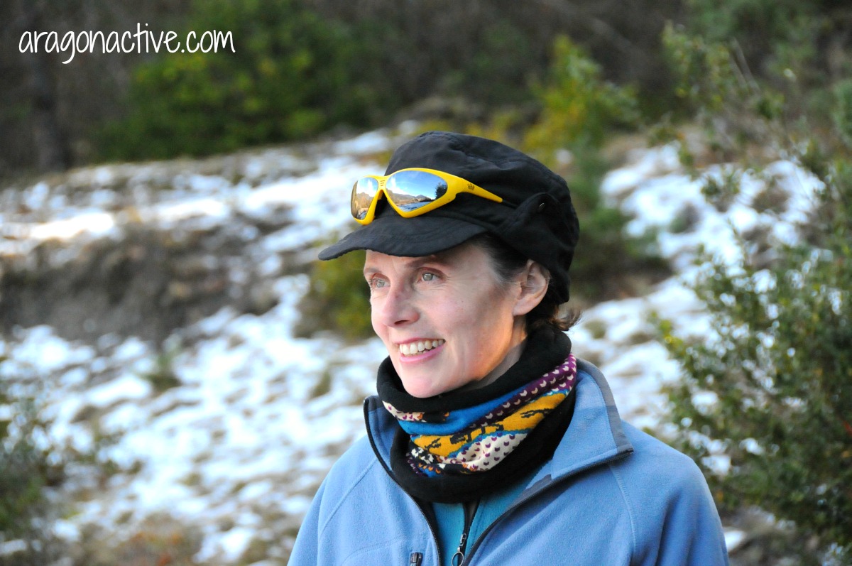 A photo of Lucy wearing hat, buff and layers on What to Wear Snowshoeing
