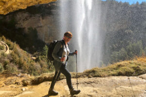 Walking behind a waterfall on our Snowshoeing Holidays Pyrenees