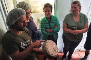 A visit to a local goat cheese producer in the Spanish Pyrenees with students on our Spanish Language Walking Holiday Advanced Level