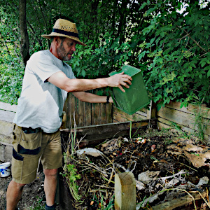 A photo of Simon putting organic waste on the compost heap on the About Us page. This page gives some background to Aragon Active small group holidays in the Spanish Pyrenees and demonstrates that as a holiday company we recycle and reuse evrything