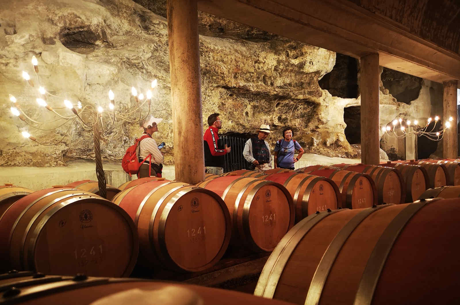 A photo showing a group tour inside a winery on our Culture and Gastronomy Holidays Spain with Aragon Active in the Spanish Pyrenees