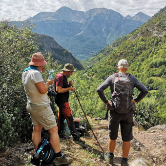 A photo of two guests ion the mountains with our Spanish teacher in the Spanish Pyrenees on Activity Holidays in Spain with Aragon Active