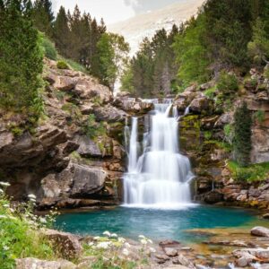 A photo of a beautiful waterfall in spring in the Ordesa National Park in the Spanish Pyrenees on our small group holidays organised by Aragon Active