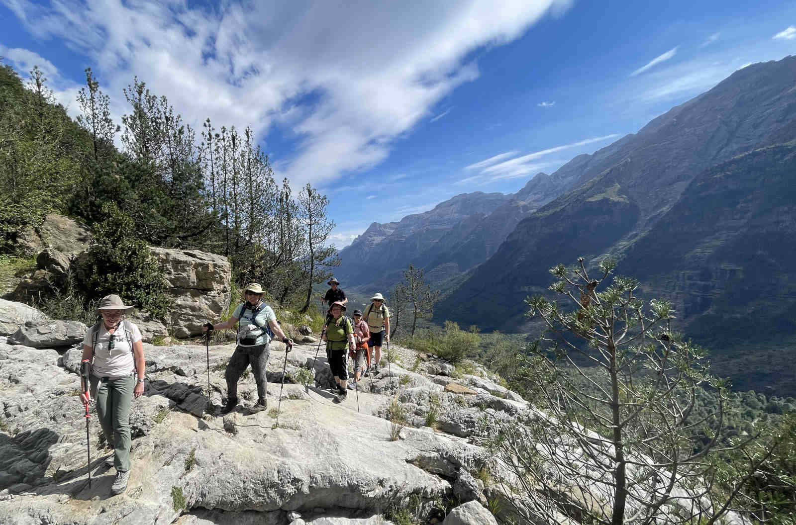 A group hiking with a guide in the National Park of Ordesa on Walking Holidays in Spain with Aragon Active