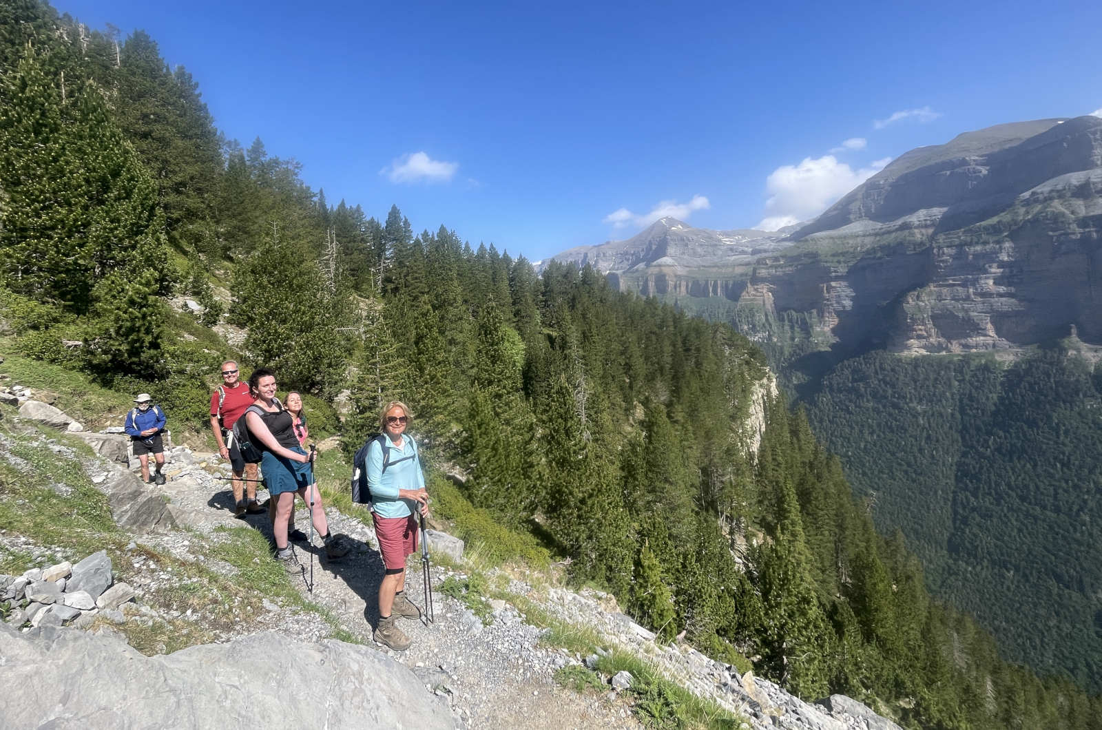 A group hiking the faja de Pelay in Ordesa on Walking Holidays in Spain with Aragon Active