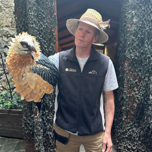 A photo of Simon with the Bearded vulture puppet at the Eco-museum on our Wildlife Holidays Spain with Aragon Active small group holidays in the Spanish Pyrenees