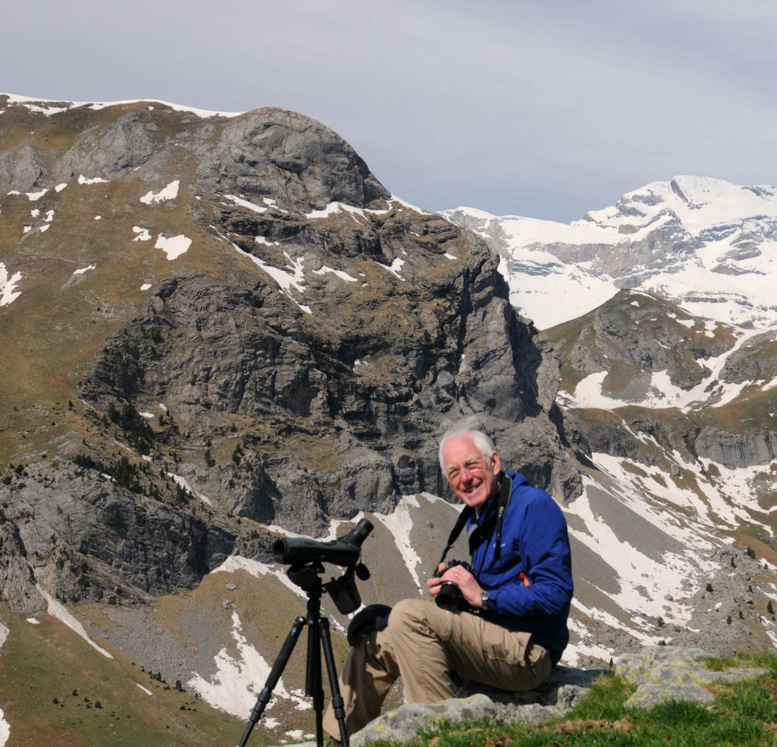 A guest in the mountains of the Pyrenees with a camera on our Wldlife Holidays Spain with Aragon Active small group holidays
