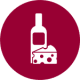 A burgundy icon with a white wine bottle and piece of cheese representing our culture and gastronomy holidays spain